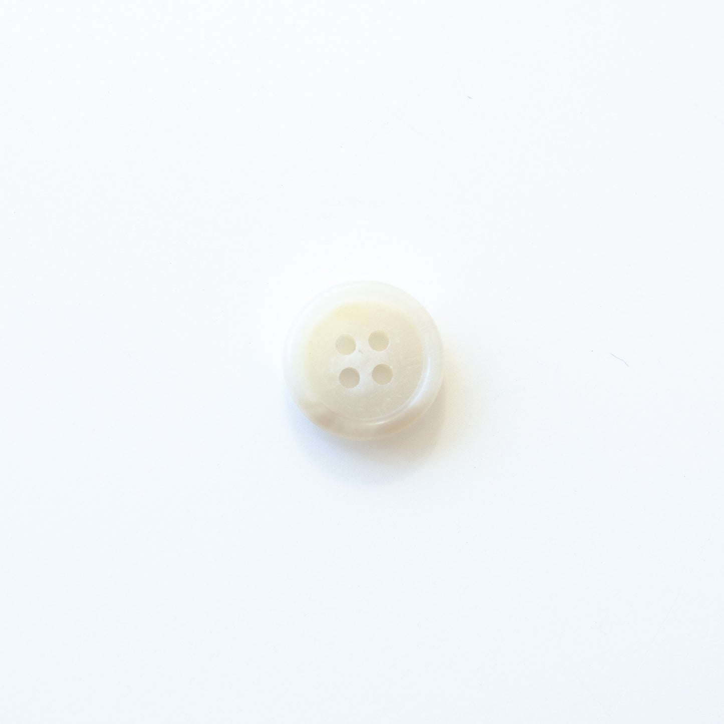 Cream “Trihorn” Jacket Buttons – Matte Center, Polished Rim