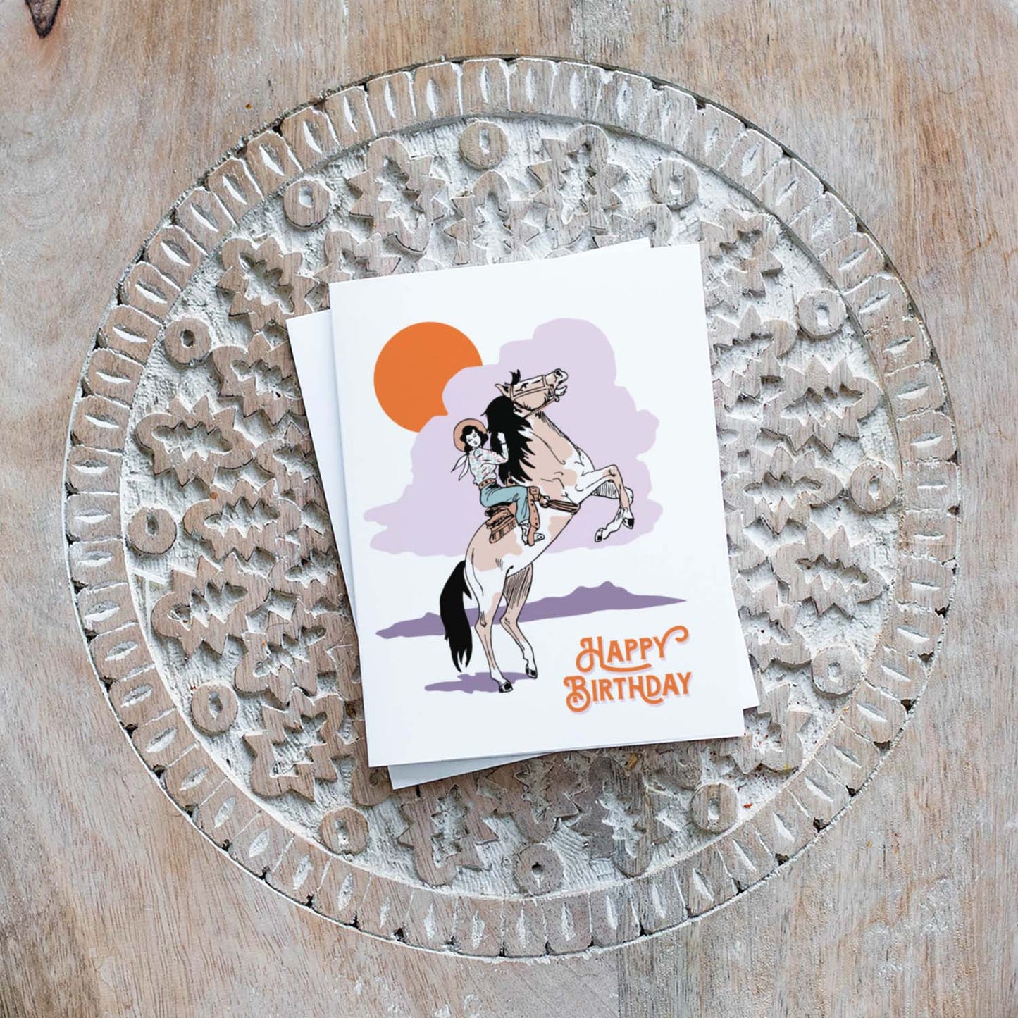 Charming birthday card highlighting a cowgirl on her horse, designed to celebrate a cowgirl's special day.
