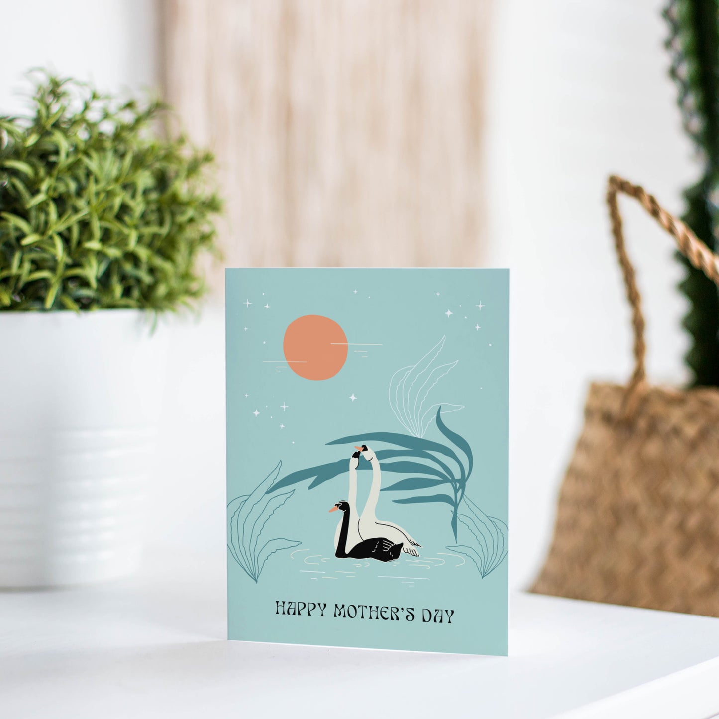 Swans Mother's Day card with an elegant swan design, perfect for honoring moms with a graceful and timeless motif.