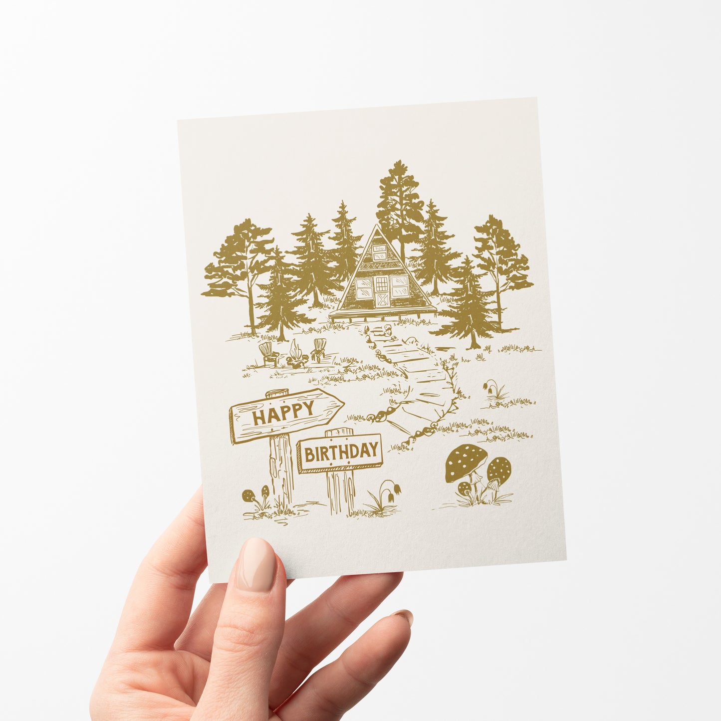 A cozy and charming birthday card featuring an illustrated A-frame cabin nestled in the woods, making it a perfect choice for nature lovers, hikers, and outdoor enthusiasts.