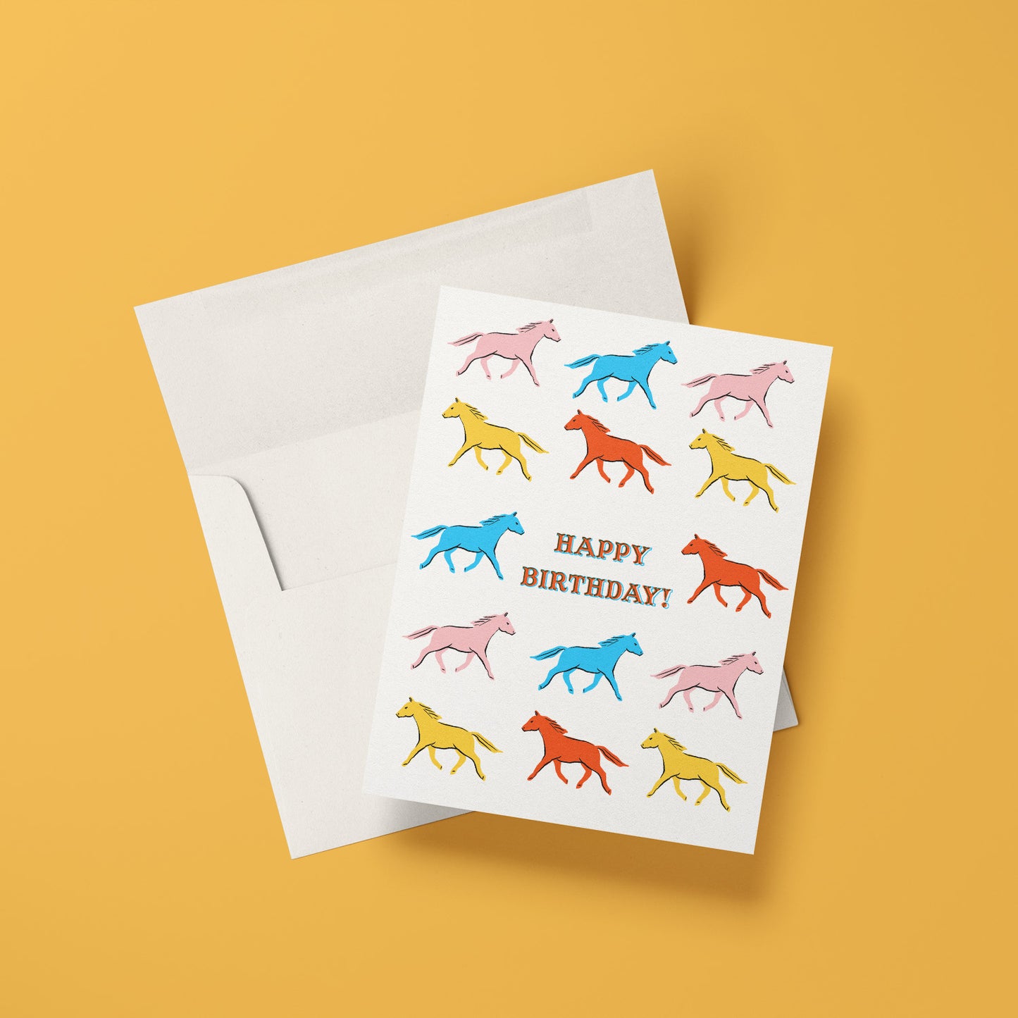 Rustic birthday card featuring a colorful illustration of horses, celebrating the spirit of the wild.