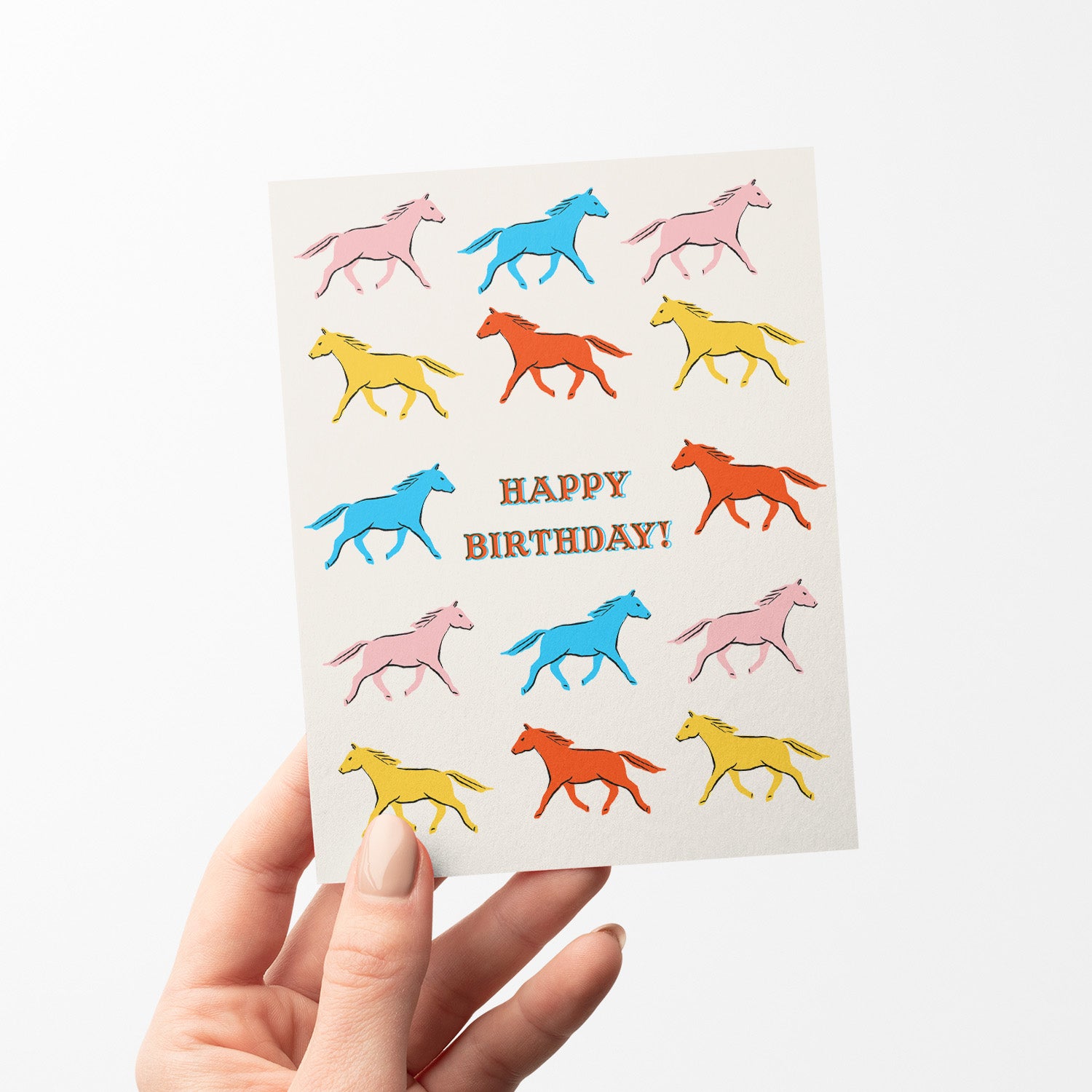 Rustic birthday card featuring a colorful illustration of horses, celebrating the spirit of the wild.