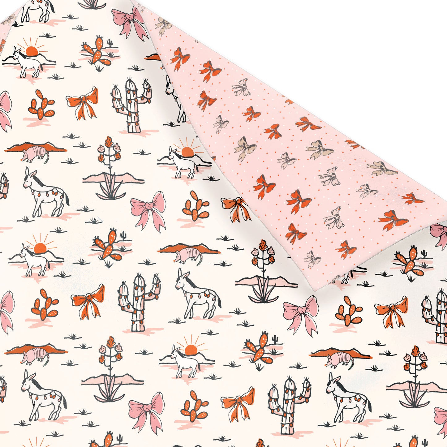 Double-sided sustainable gift wrap with cheerful desert themed holiday patterns on one side and holiday bows on the reverse, perfect for eco-friendly celebrations. 100% recyclable and compostable.