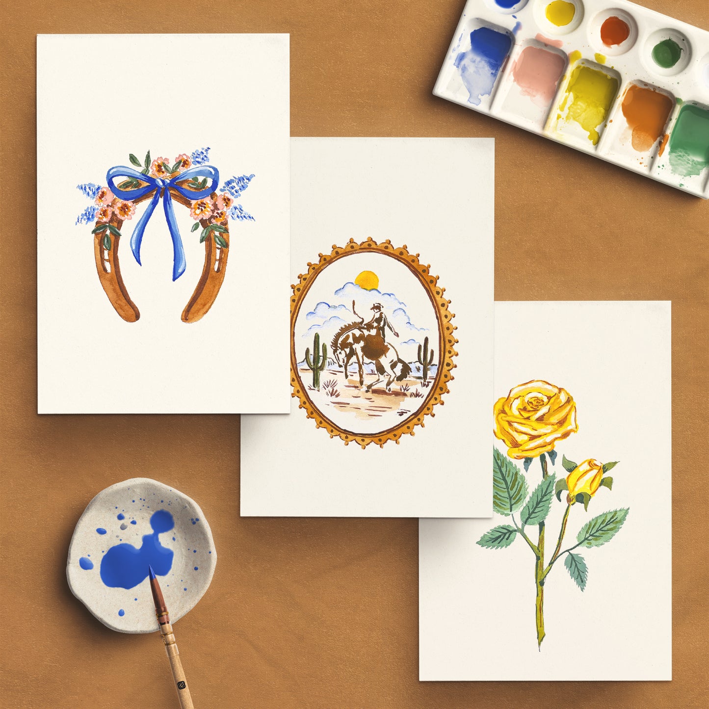Vintage Cowboy Watercolor Kit with guide book and paint swatches on a gray background