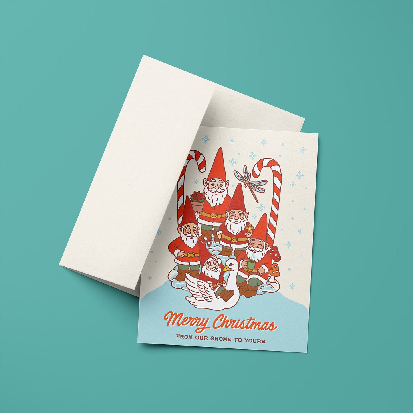 Christmas card with garden gnomes, candy canes, snowy background, and the text “Merry Christmas from our gnome to yours.”