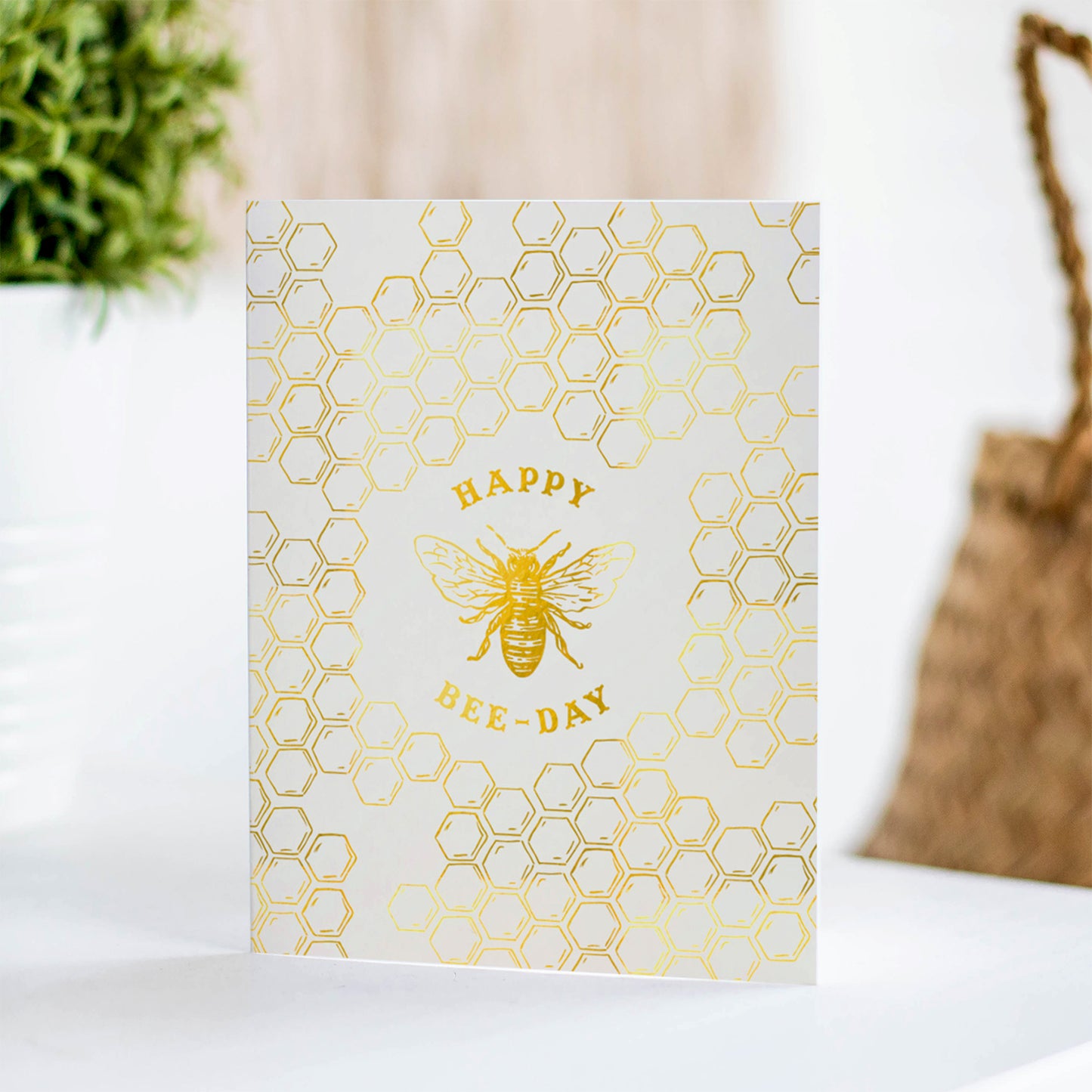 Playful birthday card with gold foil honey comb and bee illustration, a fun way to celebrate a birthday with a nature-loving twist.