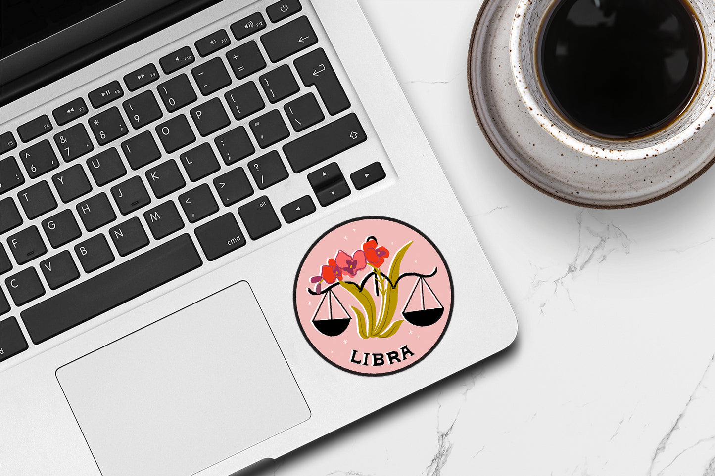 Libra zodiac sticker showcasing a balanced scales graphic in serene colors, symbolizing harmony and fairness
