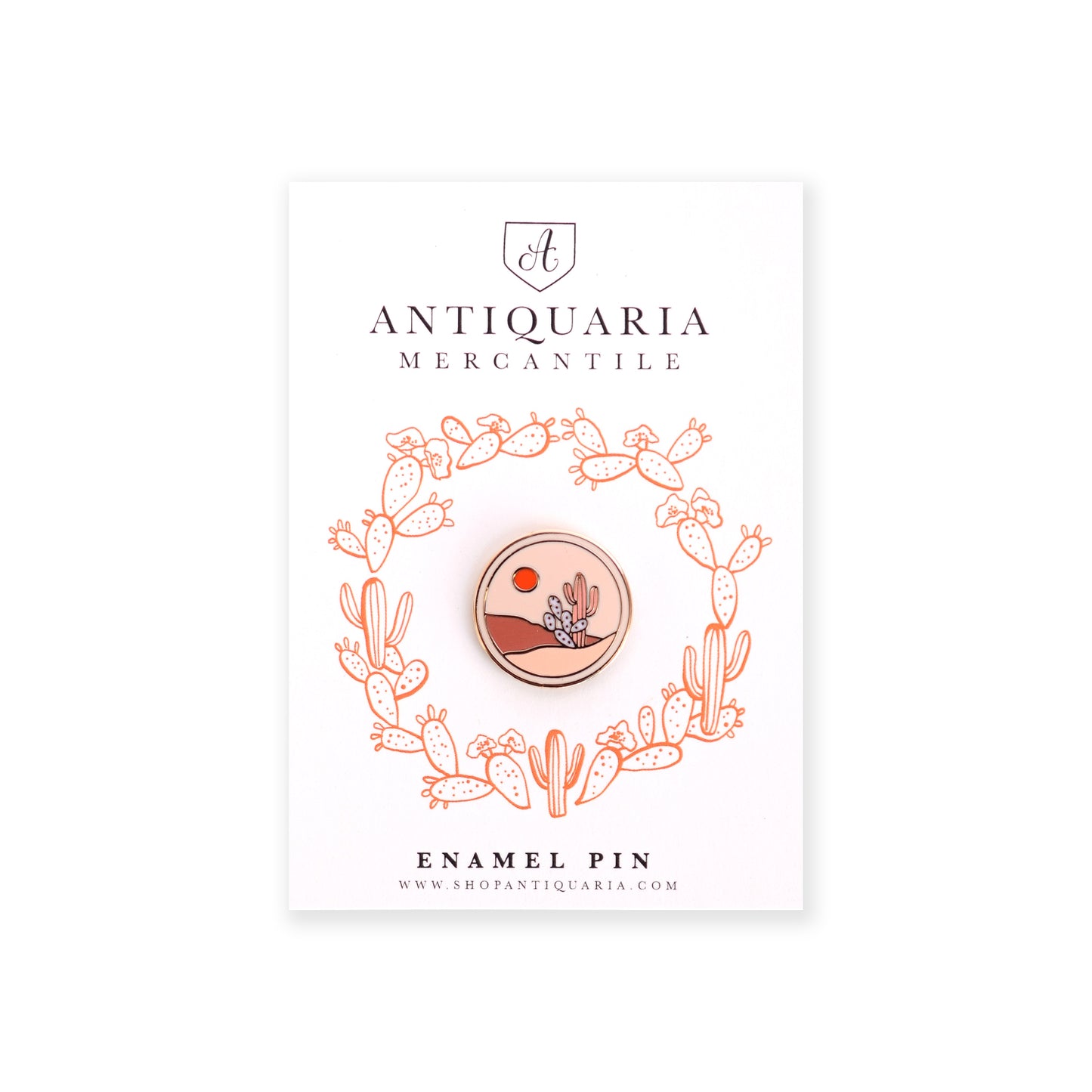 Desert scene enamel pin with gold accents, perfect for decorating jackets, bags, or stationery items