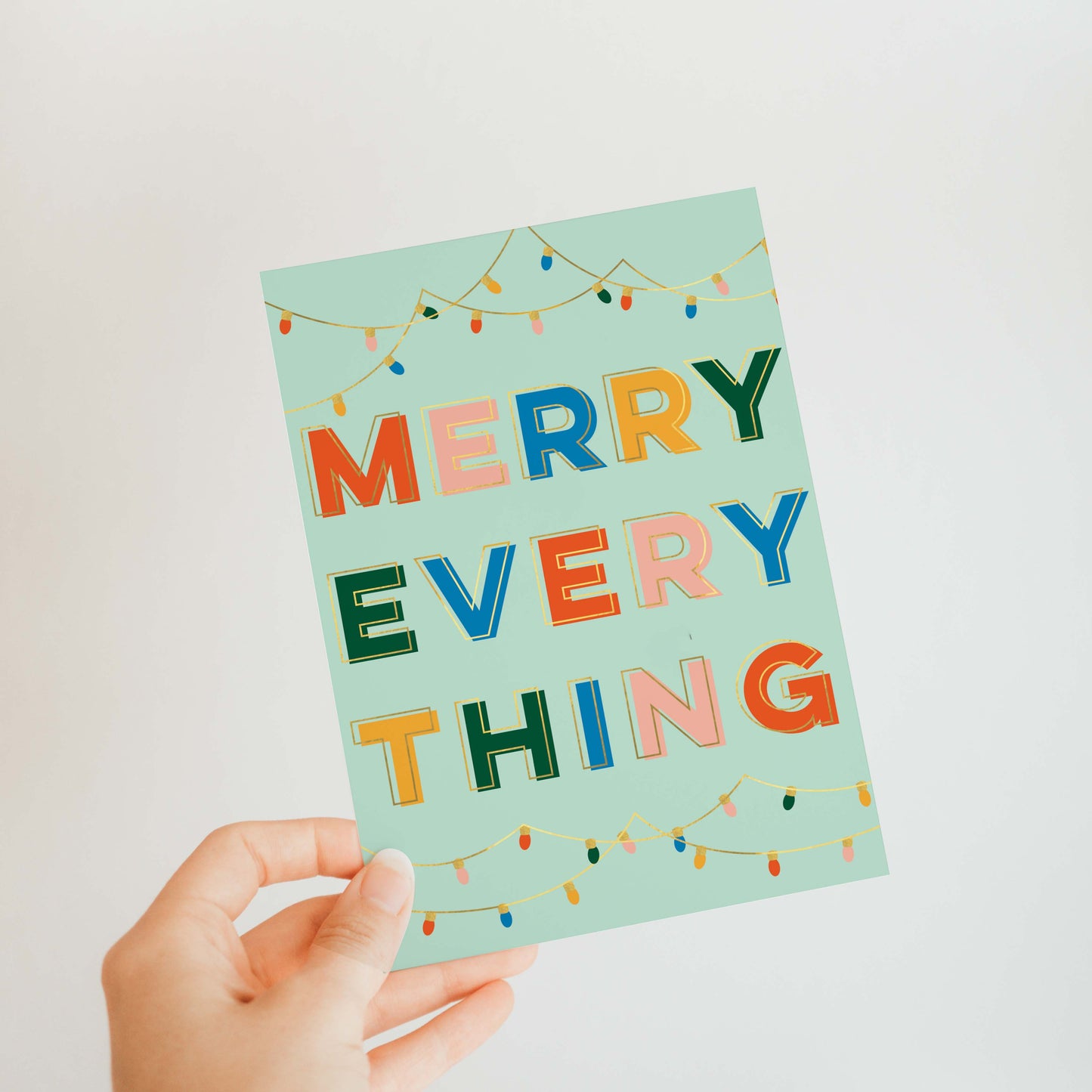 Mint Merry Everything holiday card with mint green designs and hanging Christmas lights, perfect for a fresh and festive holiday greeting, blank inside.