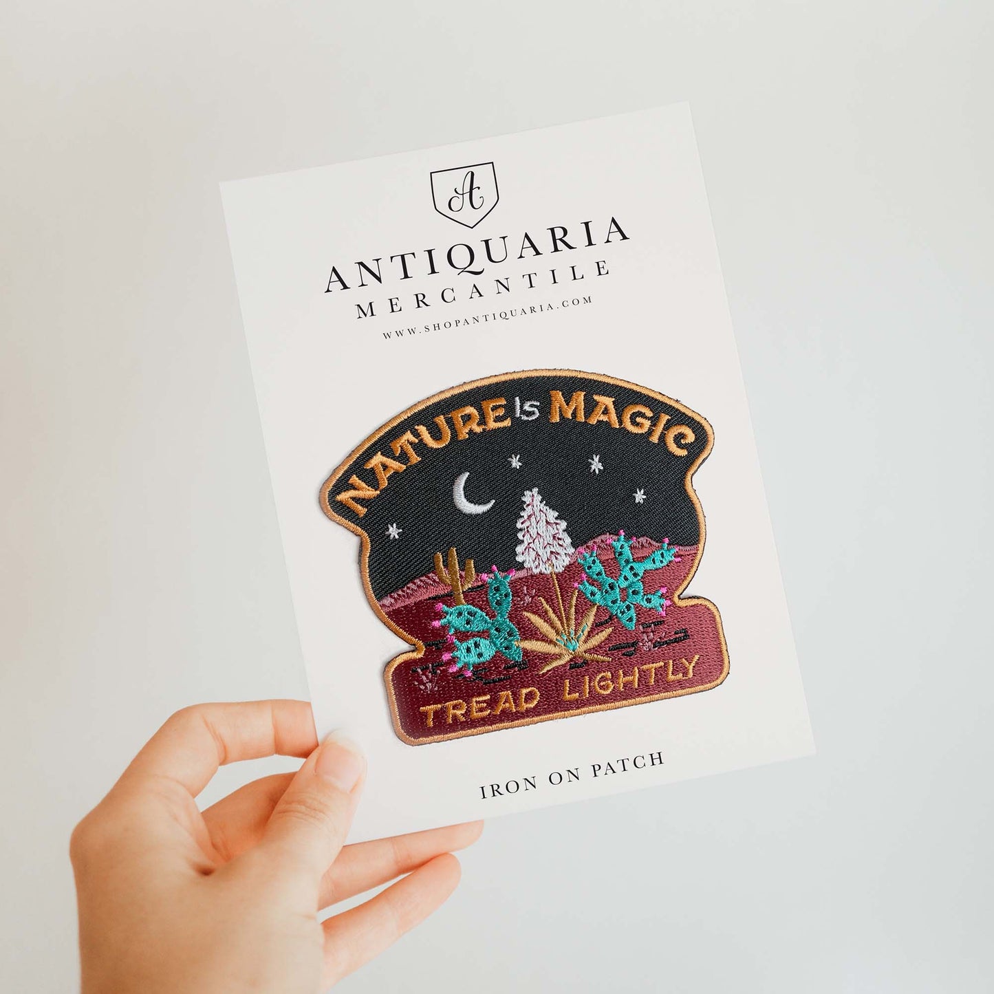 Desert themed Nature Is Magic embroidered iron-on patch featuring desert landscape, and a stary sky, perfect for adding a touch of enchantment to jackets, bags, or hats