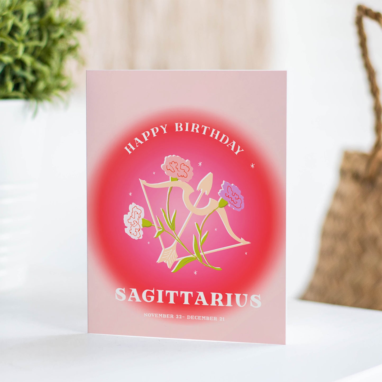 Adventurous birthday card featuring the Sagittarius symbol with an arrow motif, celebrating the free-spirited nature of Sagittarius.