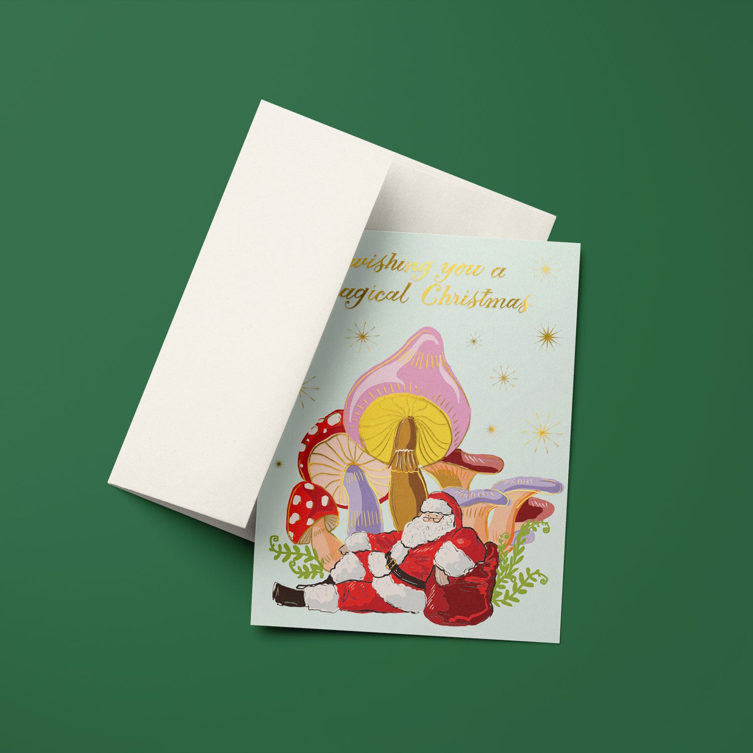 Sroomin' Santa holiday card with a whimsical Santa illustration nestled in a colorful grove of mushrooms, perfect for a playful holiday greeting, blank inside.