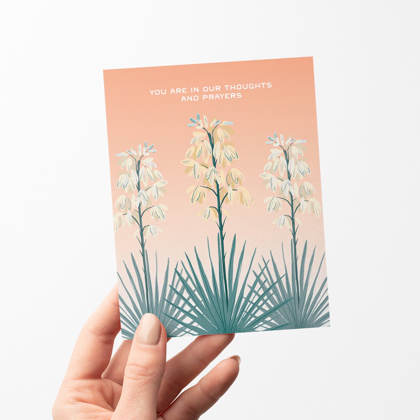 Illustration of yucca blooms with 'You Are in Our Thoughts and Prayers' on a blank sympathy card.