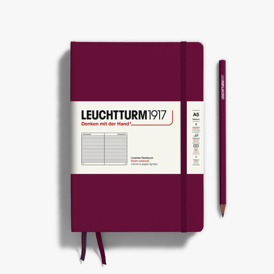 Vibrant port red hardcover notebook with lined pages, a perfect companion for everyday writing tasks.