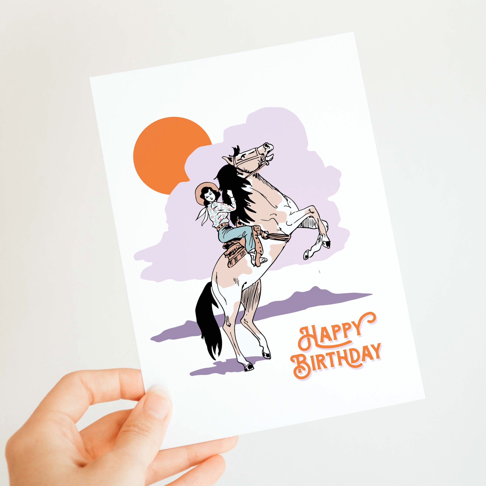 Charming birthday card highlighting a cowgirl on her horse, designed to celebrate a cowgirl's special day.