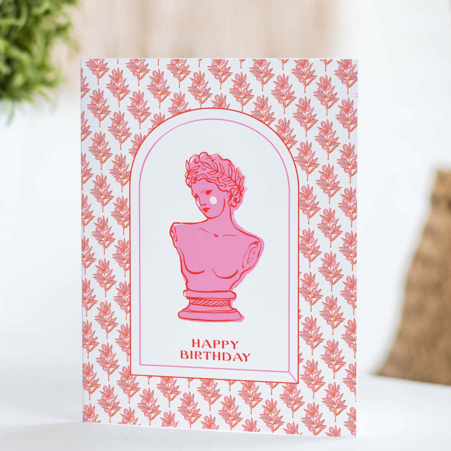 Stylish birthday card inspired by Grecian motifs, with classic patterns and ancient Greek bust, ideal for an elegant celebration.