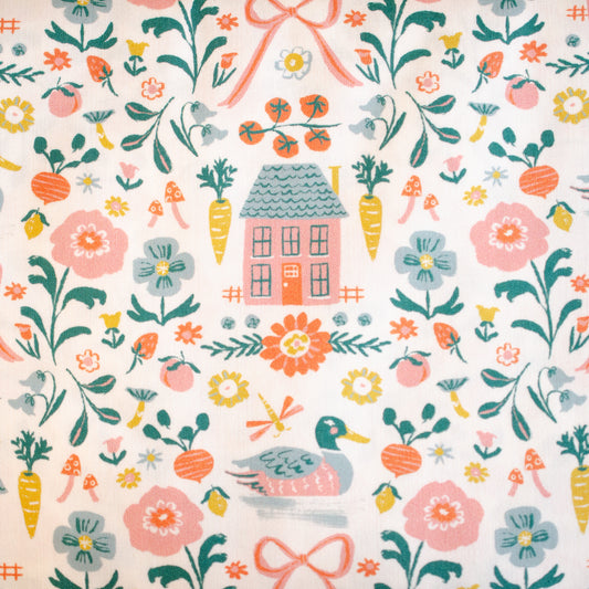 Colorful pattern with flowers, houses, and animals on a light background