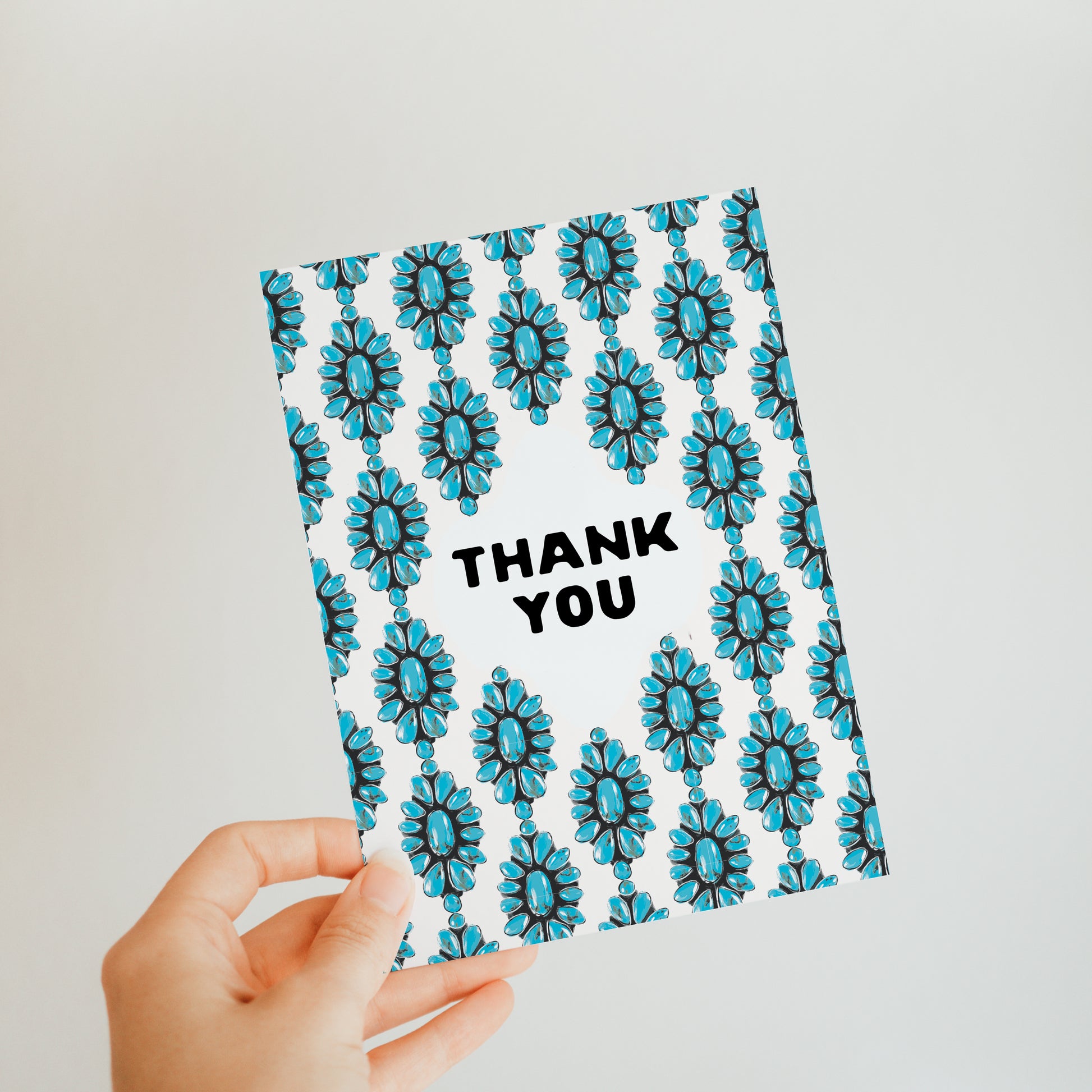 Turquoise thank you card with a bold, vibrant turquoise jewelry, featuring simple and modern typography. A southwest themed card for showing appreciation.