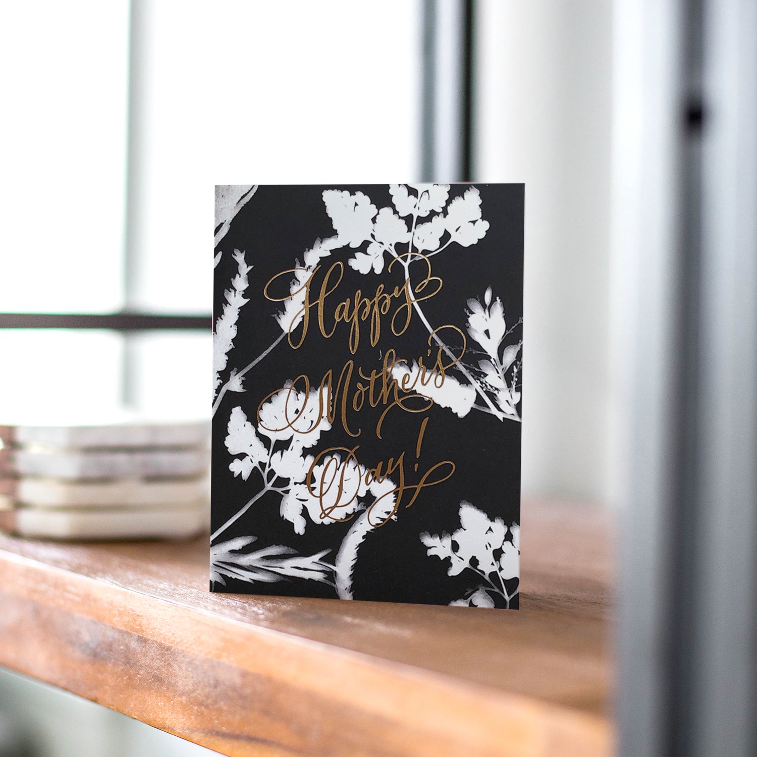 Sunprint Mother's Day card featuring delicate sunprint-inspired floral patterns, great for moms who appreciate nature and art.