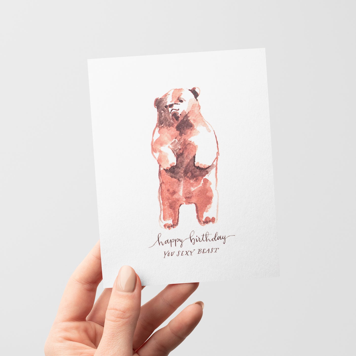 Playful birthday card with a cute watercolor bear and a cheeky saying, celebrating the fun side of birthdays for a confident, stylish friend.