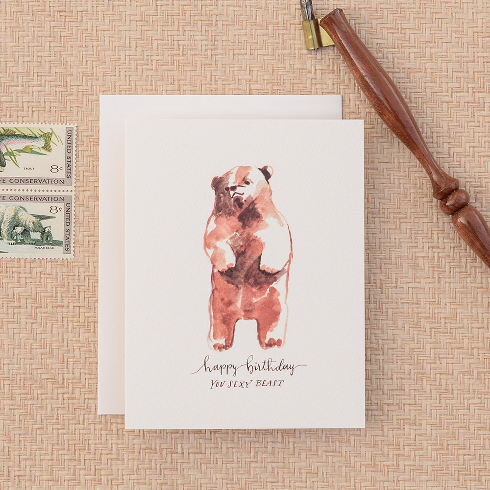 Playful birthday card with a cute watercolor bear and a cheeky saying, celebrating the fun side of birthdays for a confident, stylish friend.