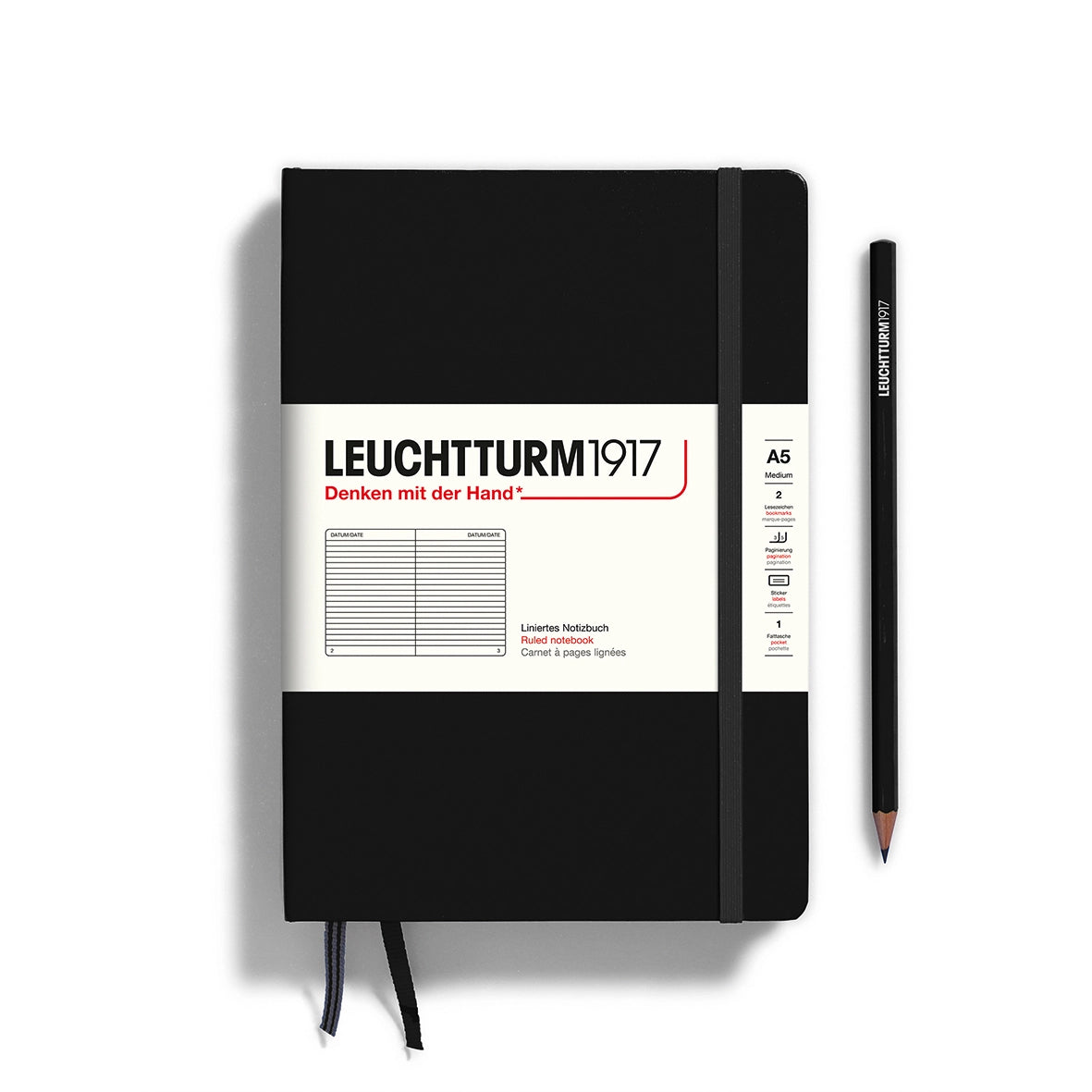 Sleek black hardcover notebook with lined pages, a perfect companion for everyday writing tasks.