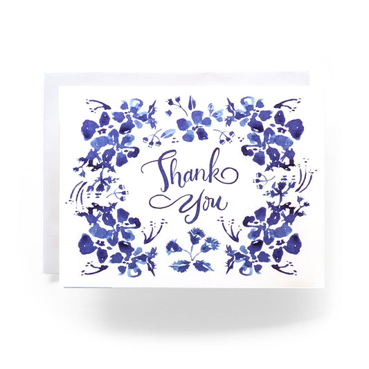 Thank you card with a charming watercolor illustrations of blue wildflowers and a vintage-style font