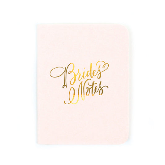 Pink softcover staple-bound notebook with "brides notes" and gold accents. Perfect for the bride on the go!