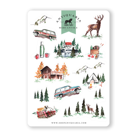 Cozy cabin-themed sticker sheet featuring rustic designs like pine trees, campfires, and woodland animals, perfect for adding a touch of nature to scrapbooks, planners, or craft projects.