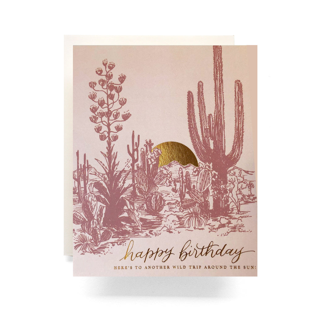 Stunning birthday card featuring a desert sunset backdrop with silhouetted desert landscape, creating a warm and tranquil atmosphere for birthday wishes.