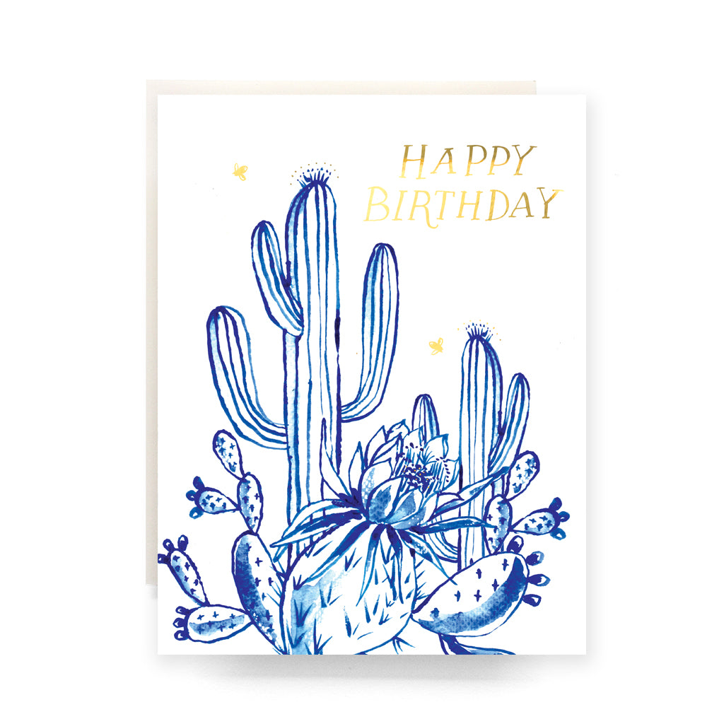 Charming birthday card showcasing a serene cactus garden with a variety of cacti in vivid blue, capturing the beauty of nature for a unique birthday celebration.