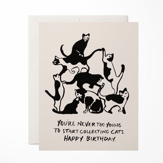 Fun and whimsical birthday card showcasing a cat tower filled with playful cats, designed for cat lovers celebrating their special day.