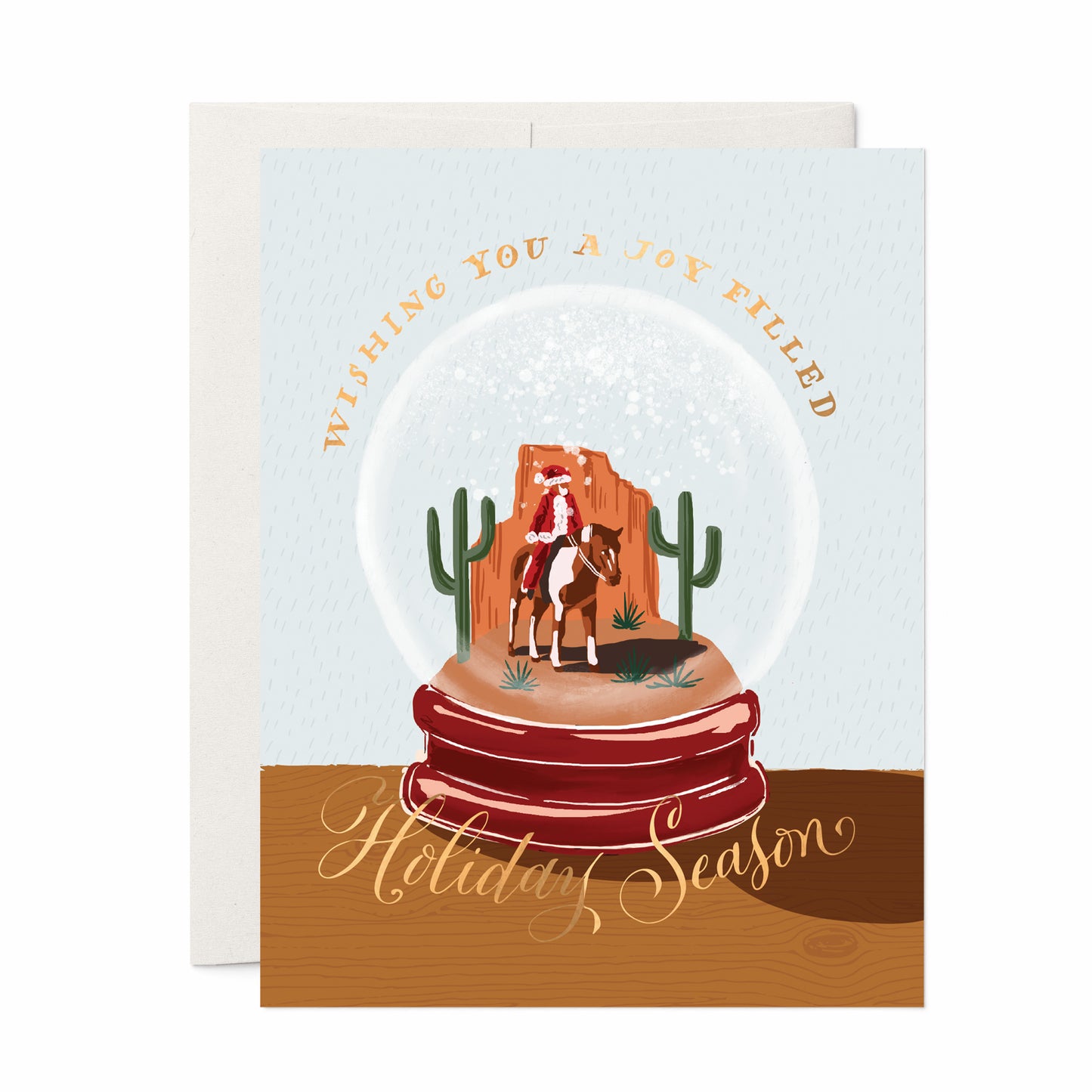 Cowboy Santa snowglobe holiday card, with a whimsical cowboy Santa inside a snowglobe, perfect for holiday fun, blank inside.