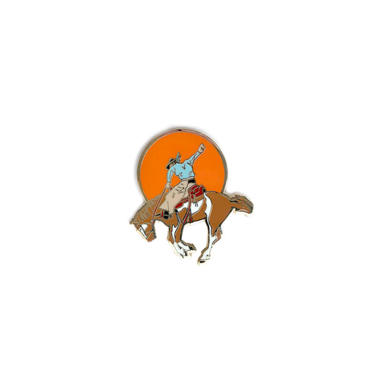 enamel pin featuring a cowboy and bucking bronco with gold accents, perfect for decorating jackets, bags, or stationery items