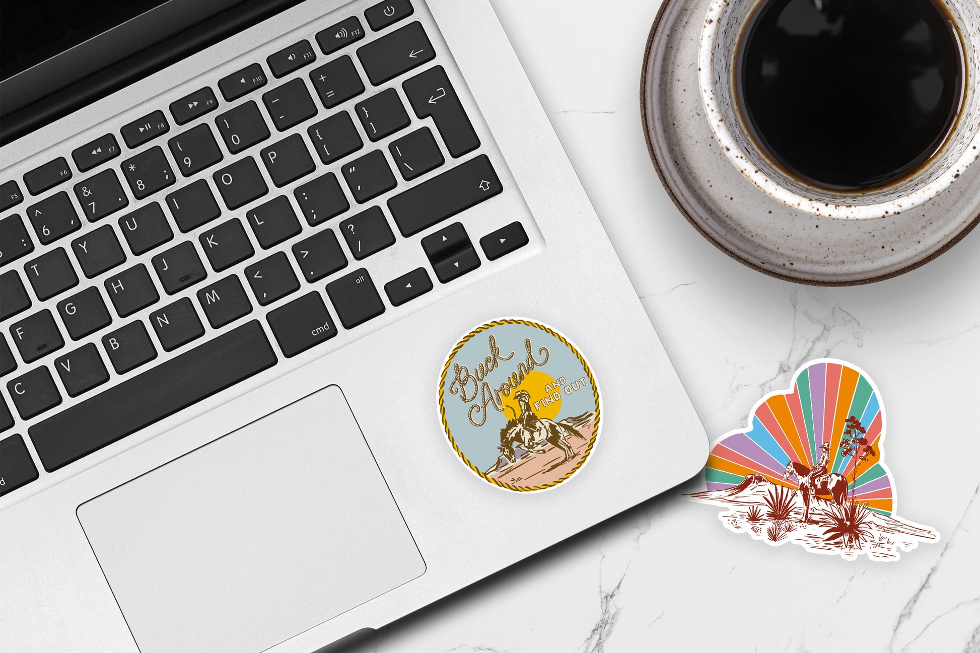 Circular sticker with a cowboy riding a bucking horse and text 'Buck Around and Find Out' on a light blue background.