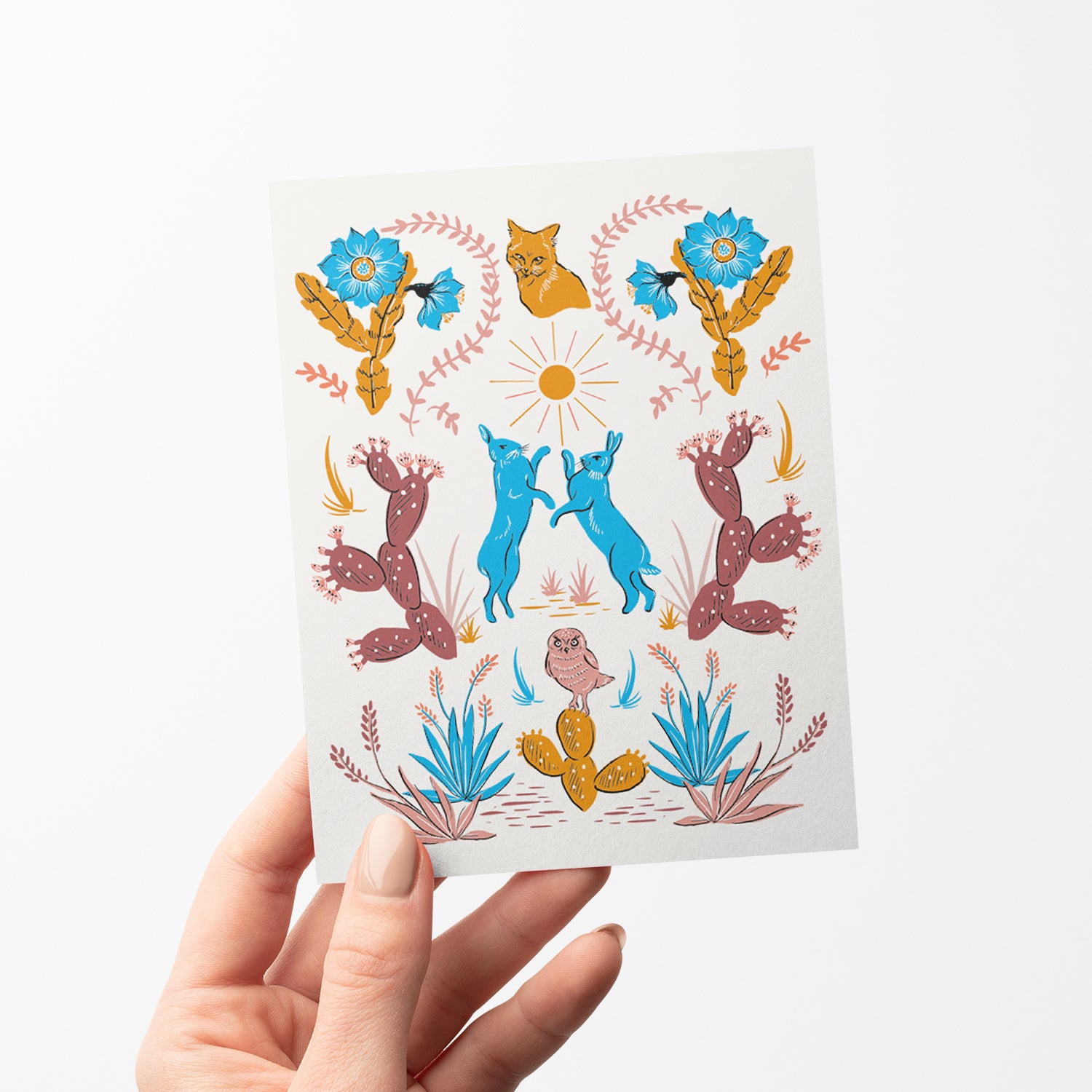 Blank card with desert motifs including cacti and animals, ideal for nature lovers and any occasion.
