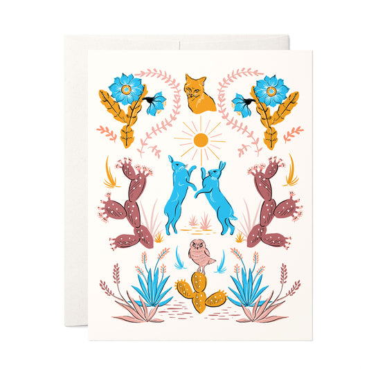 Blank card with desert motifs including cacti and animals, ideal for nature lovers and any occasion.
