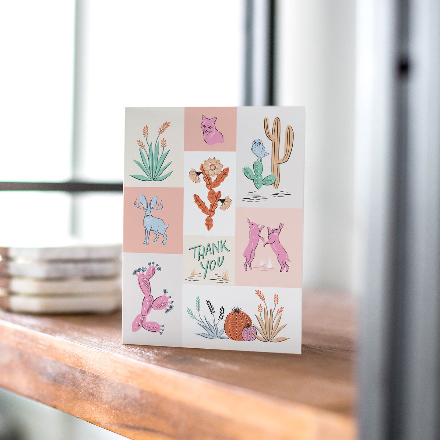 Thank you card with desert-themed illustrations including cacti, flowers, jackrabbits, fox, and owl.