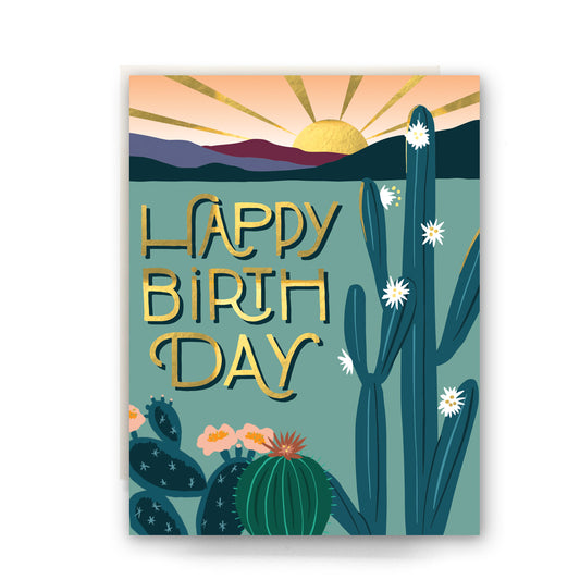 Serene birthday card showcasing a tranquil desert morning with soft hues and cacti, creating a peaceful vibe for birthday wishes.