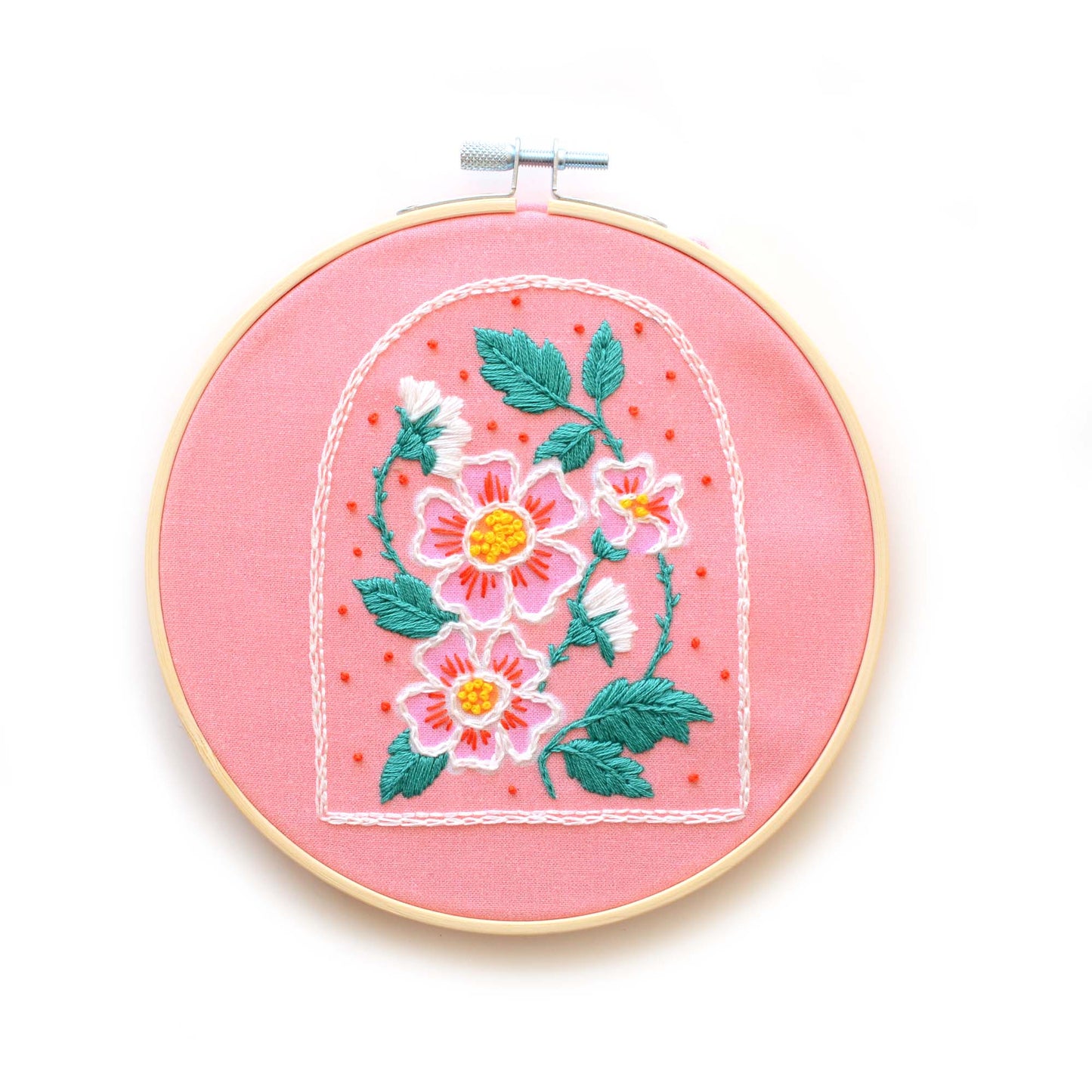 Embroidery patch kit with fabric, wooden hoop, thread, needle, and instructions for beginners, featuring beautifully illustrated roses