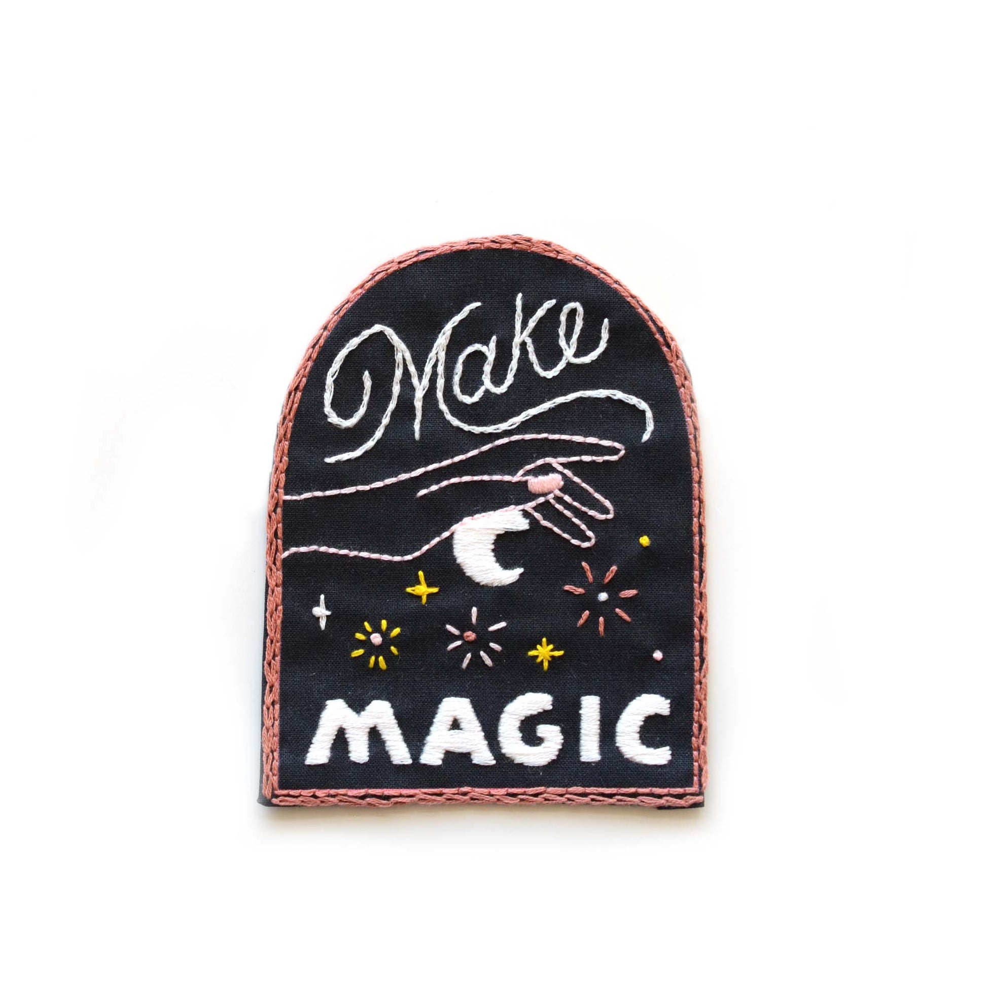 Embroidery patch kit with fabric, wooden hoop, thread, needle, and instructions for beginners, a stary sky in a hand with the saying "make magic"