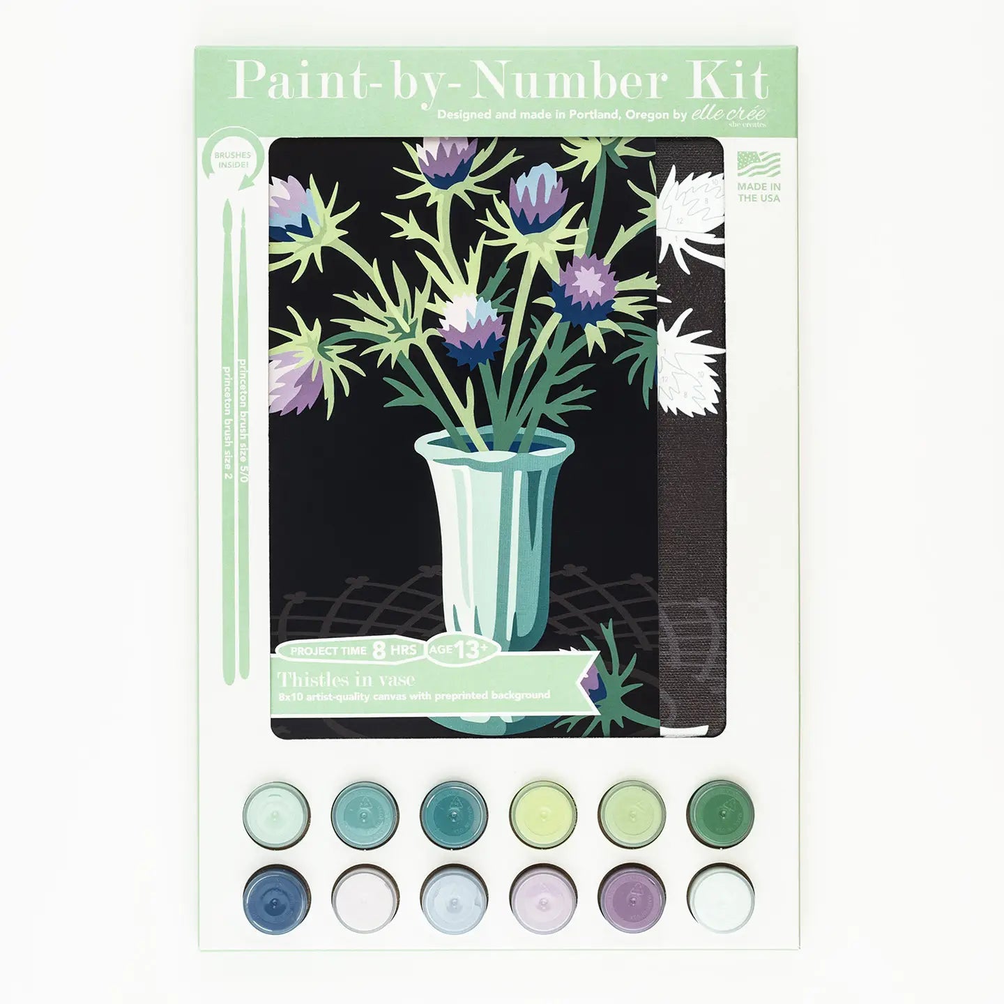 Paint by number kit featuring a bouquet of purple thistles in a vase, includes canvas, paint set, and brushes."