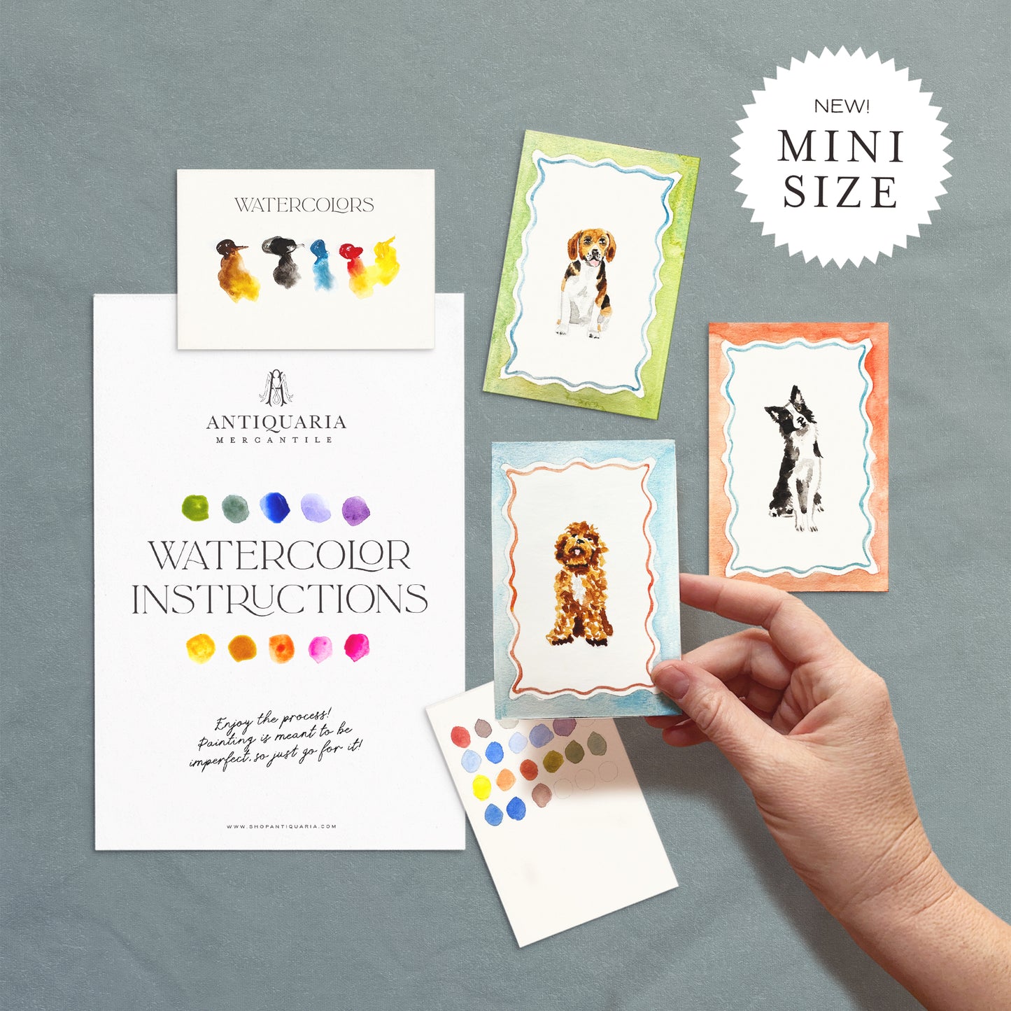 Mini watercolor instruction cards with dog illustrations on a gray background