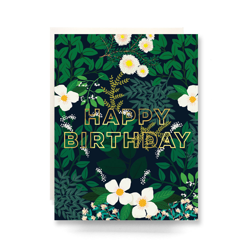 Whimsical birthday card with a floral scene, showcasing colorful flowers, lush greenery, and a touch of gold.