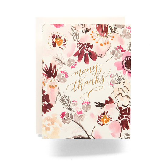 Thank you card with a vibrant watercolor floral design and 'Many Thanks' in gold script.