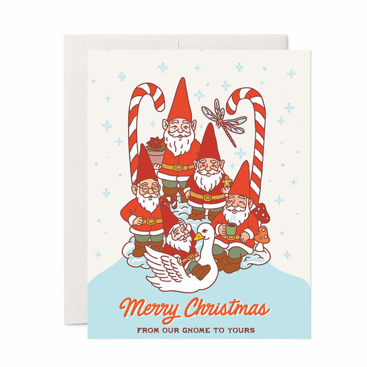 Christmas card with garden gnomes, candy canes, snowy background, and the text “Merry Christmas from our gnome to yours.”