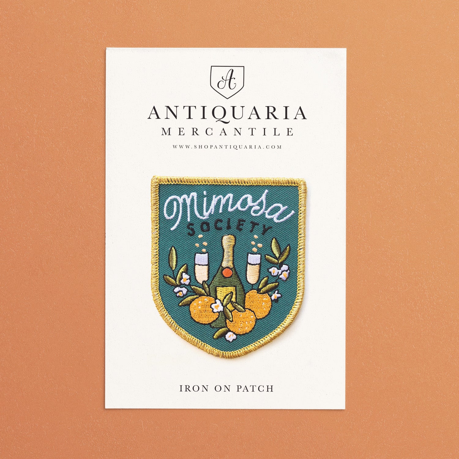 Elegant Mimosa Society embroidered iron-on patch with floral and champagne glass design, perfect for adding a stylish touch to jackets, bags, or accessories