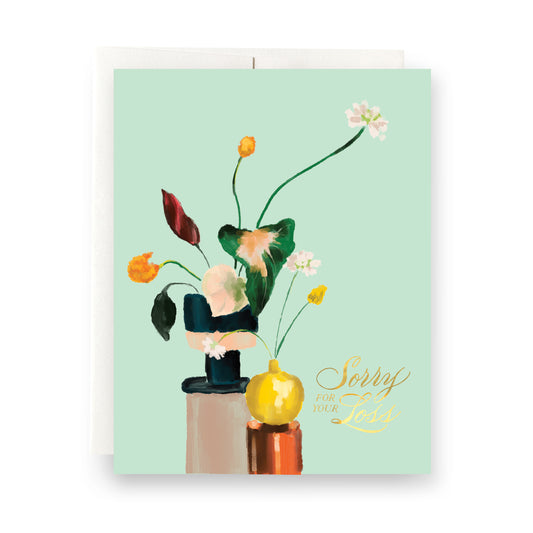 Illustration of houseplants with 'Sorry for Your Loss' in elegant calligraphy on a blank sympathy card