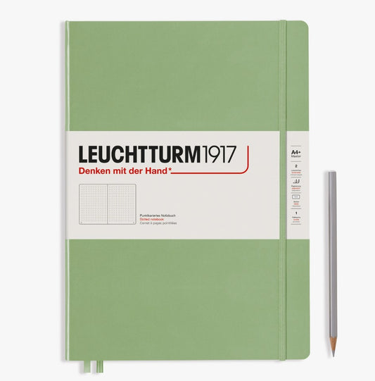 Large A4 Hardcover dot grid notebook in classic sage with, ideal for bullet journaling and creative sketching.