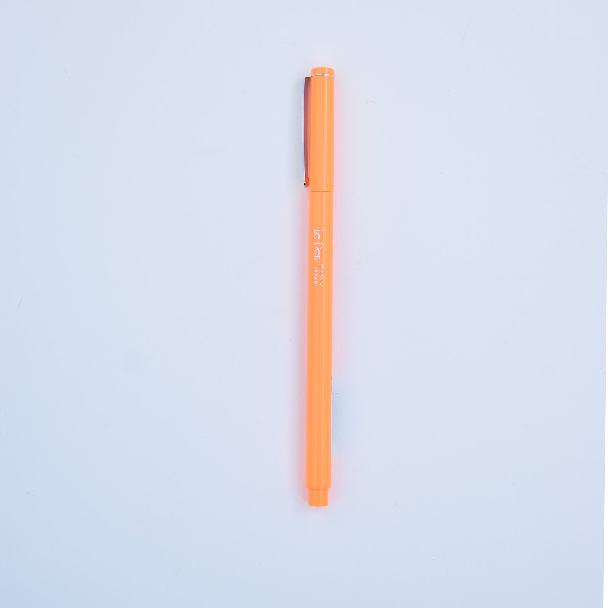 Le Pen Fluorescent Orange - vibrant orange fine-tip pen, perfect for highlighting, creative projects, and eye-catching notes.